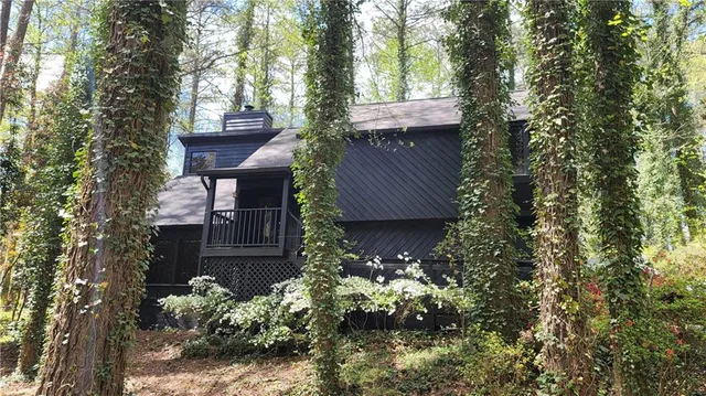 a house with lots of trees