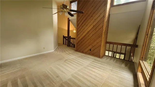 a view of a room with a large window