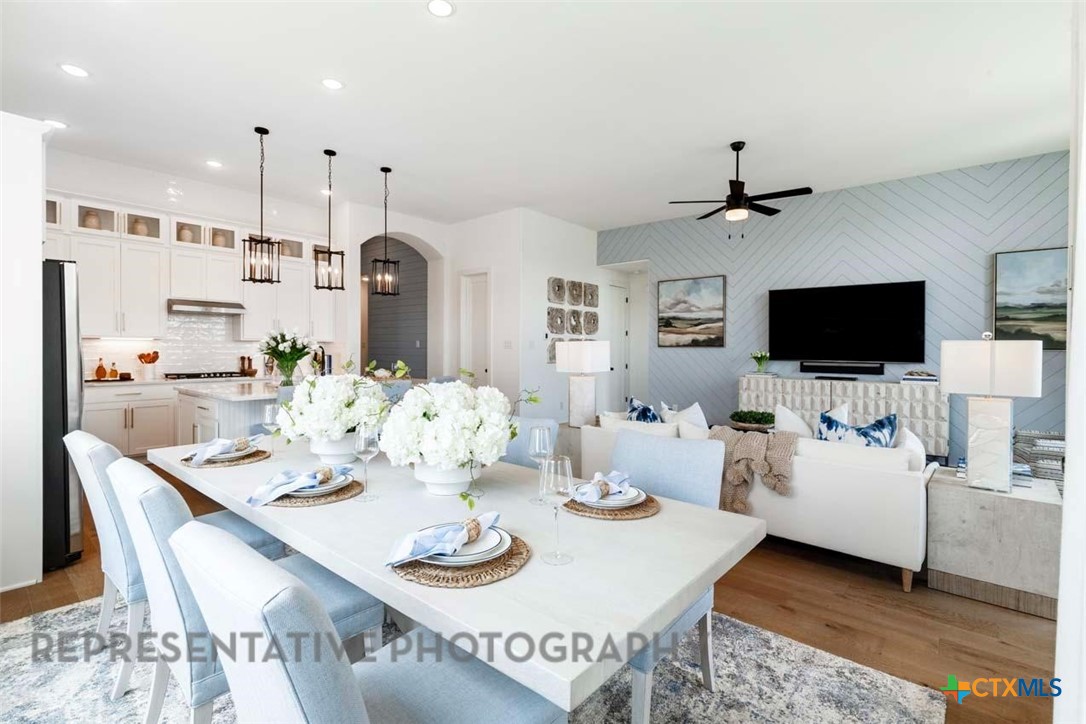 840 Jackson River Loop Kyle, TX 78640 - Photo 19 of 31 a view of a dining room with furniture