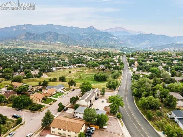 a view of a city with mountain