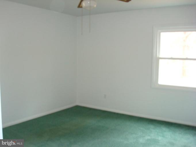 22542 Old Rolling Road California, MD 20619 - Photo 23 of 27 Bedroom With Half Bath