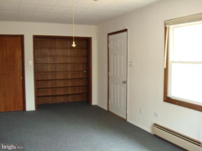 22542 Old Rolling Road California, MD 20619 - Photo 26 of 27 More shelves in the family room.