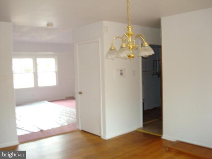22542 Old Rolling Road California, MD 20619 - Photo 5 of 27 Dining Room into the Family room or the kitchen
