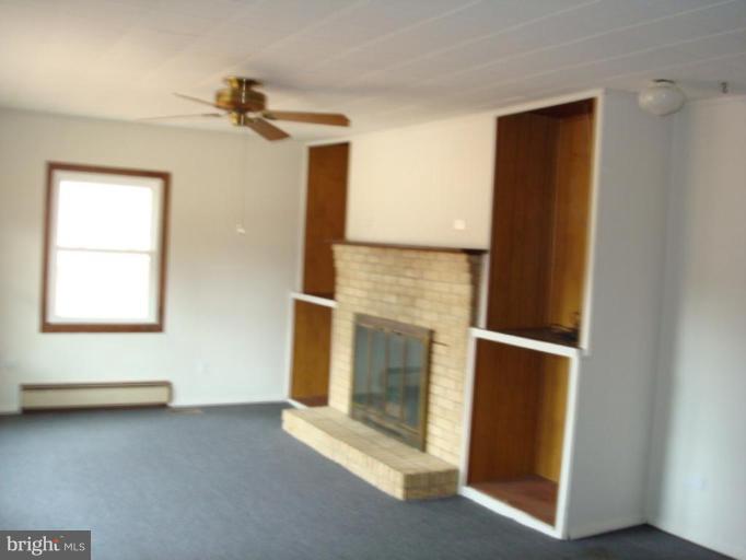 22542 Old Rolling Road California, MD 20619 - Photo 6 of 27 Nice Fireplace in the family room