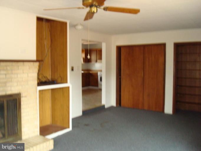 22542 Old Rolling Road California, MD 20619 - Photo 7 of 27 Family room into the kitchen
