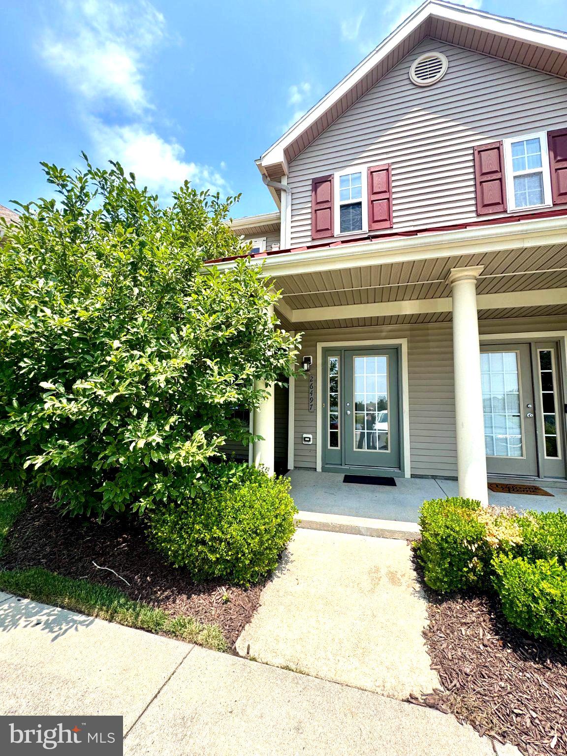 26497 Thunder Road Millsboro, DE 19966 - Photo 2 of 30 Charming entrance with lush greenery.