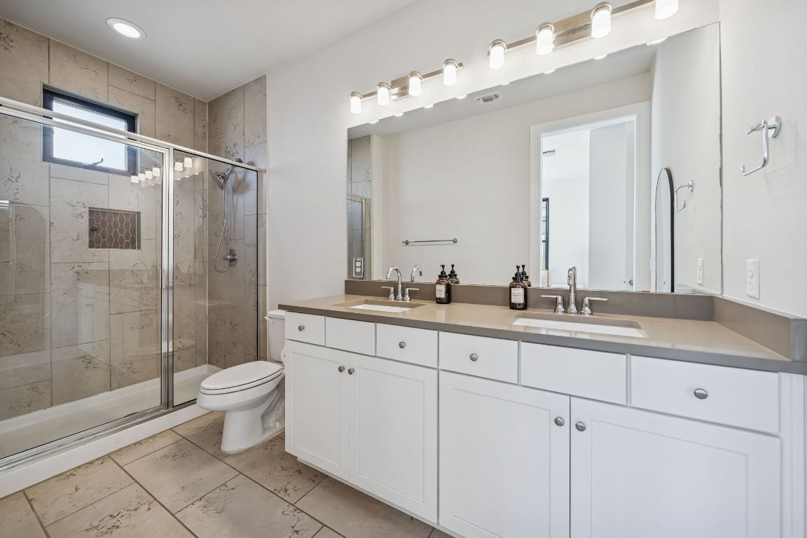 3322 McCurdy Street Austin, TX 78723 - Photo 17 of 39 En suite bathroom off primary bedroom