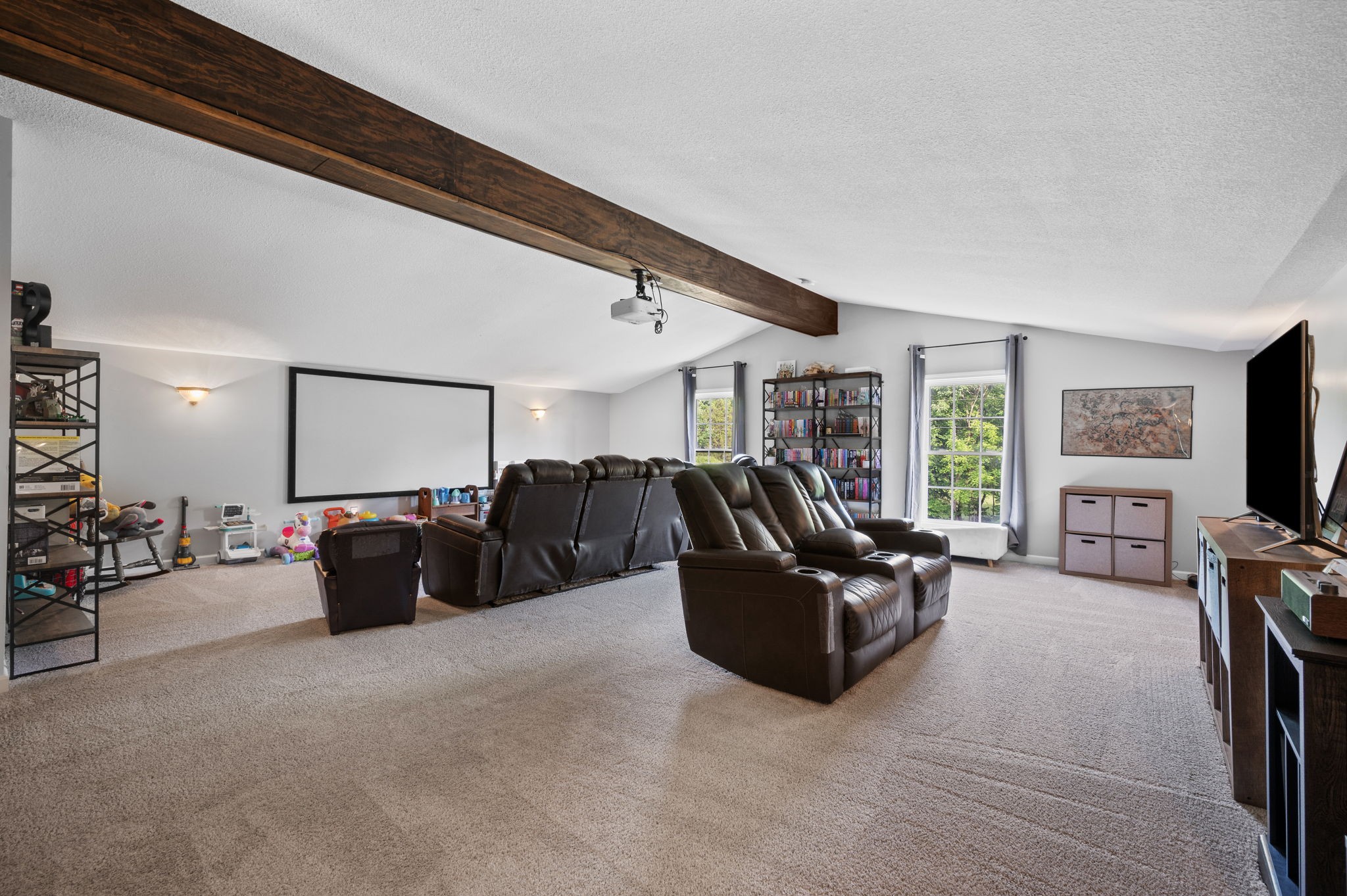 1197 Biter Road Cunningham, TN 37052 - Photo 28 of 38 a living room with furniture and a flat screen tv