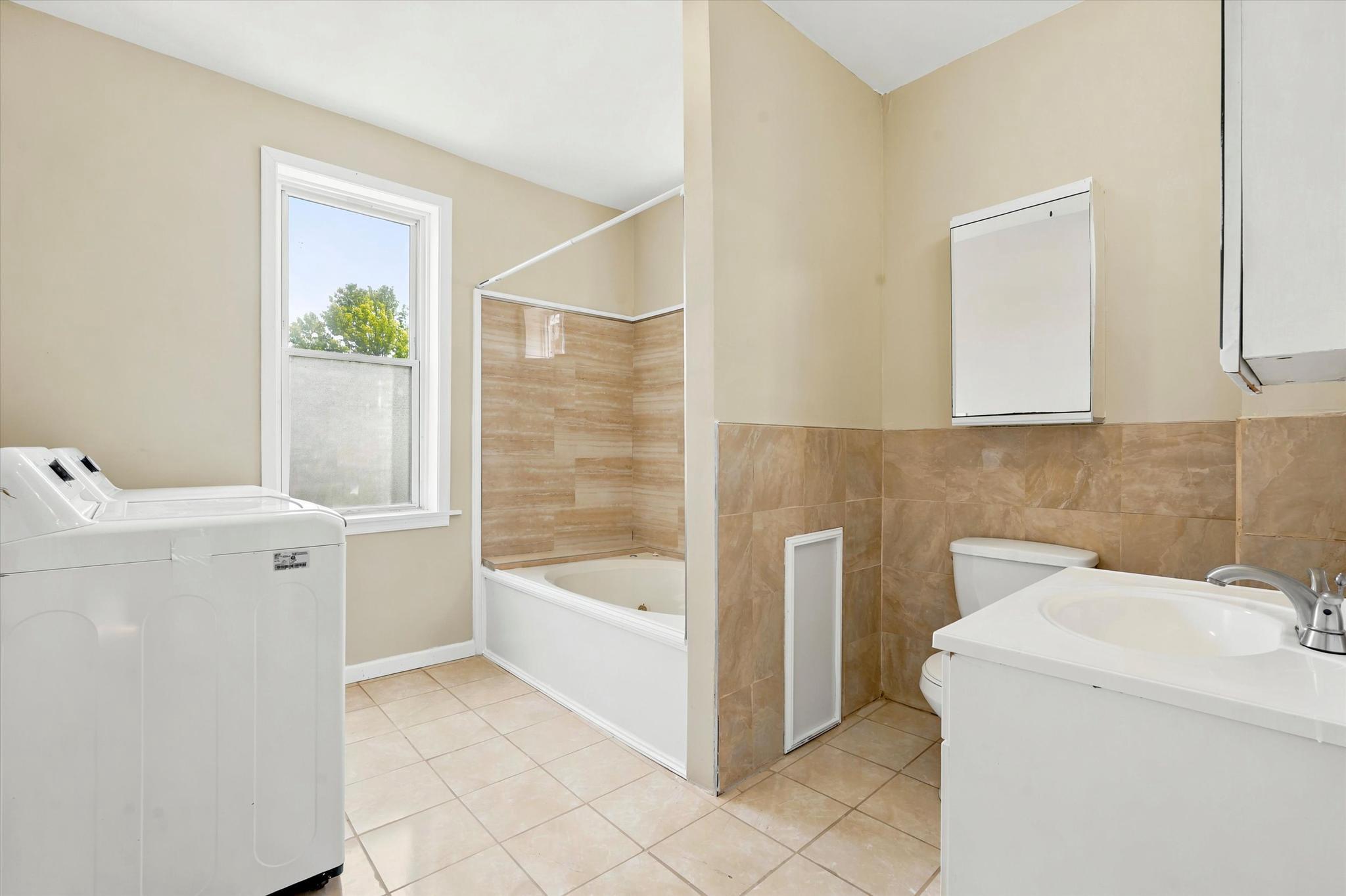 3716 Stanton Street Philadelphia, PA 19129 - Photo 10 of 15 Second floor bathroom with washer/dryer