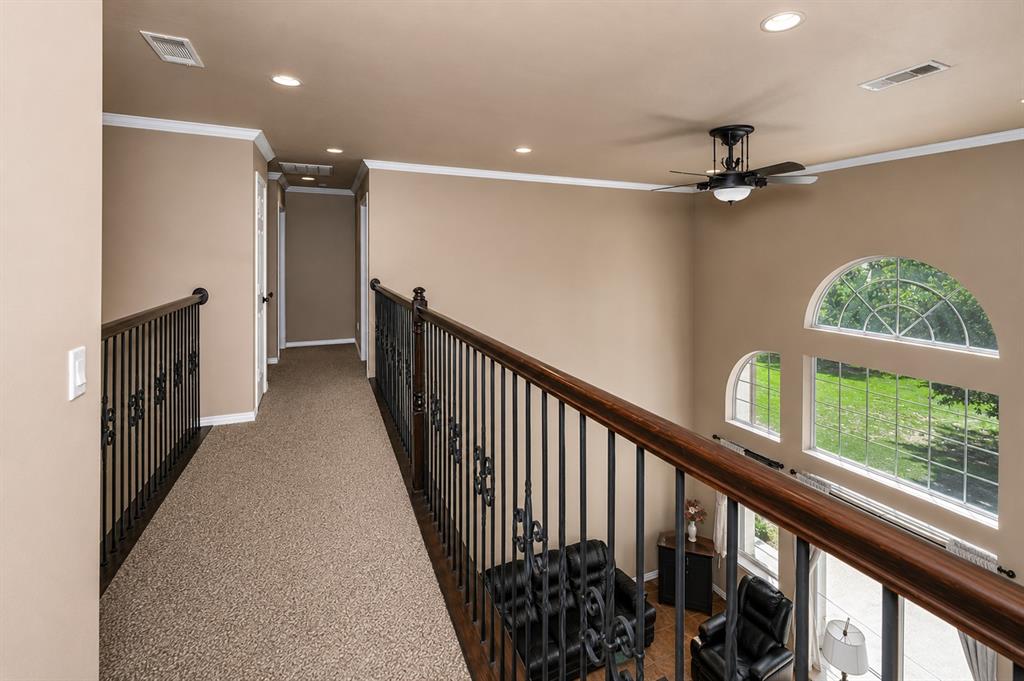 100 Manders Court Runaway Bay, TX 76426 - Photo 20 of 33 a view of a hallway with windows