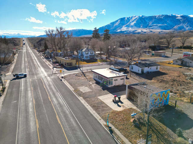 656 South Bullion Canyon Road Marysvale, UT 84750 - Photo 50 of 57 Drone / aerial view of a mountain backdrop; featuring a view of the town of Marysvale