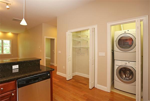 655 East 2nd Street, Unit 209 Boston, MA 02127 - Photo 3 of 16 a view of livingroom with washer and dryer