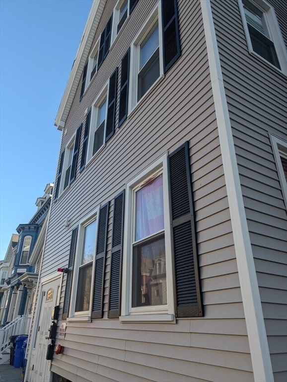 167 Lexington Street, Unit 167 Boston, MA 02128 - Photo 3 of 34 a view of a house with a door