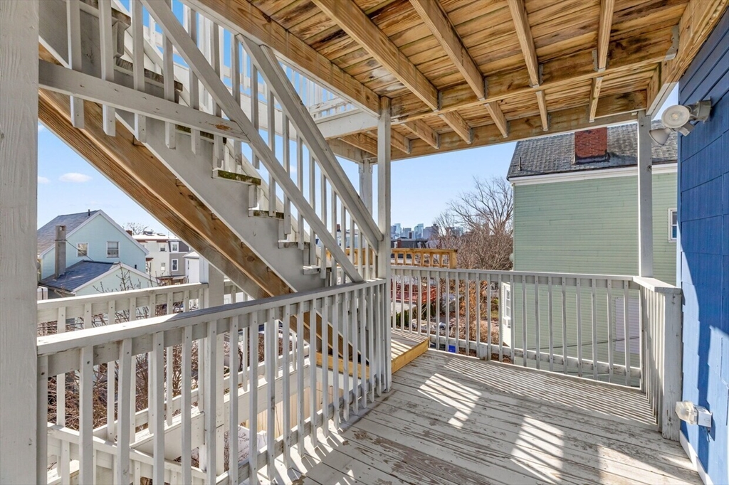 167 Lexington Street, Unit 167 Boston, MA 02128 - Photo 31 of 34 a view of a balcony with staircase