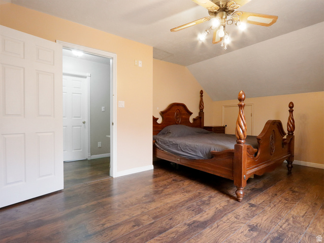 270 East 100 North Monroe, UT 84754 - Photo 29 of 65 Expansive room featuring wood-finish flooring, a vaulted ceiling, and a ceiling fan with integrated lighting