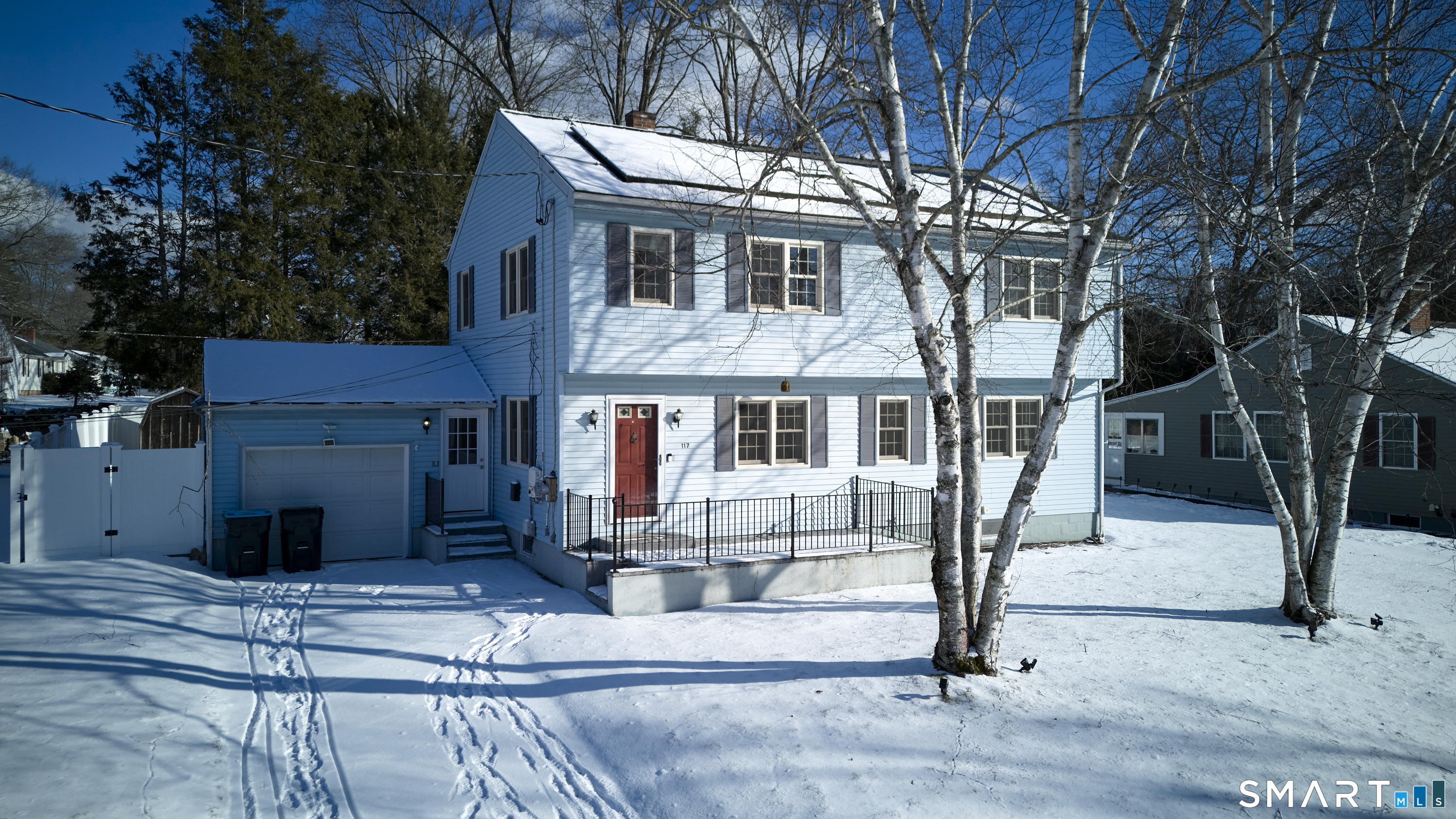 a front view of a house with a porch
