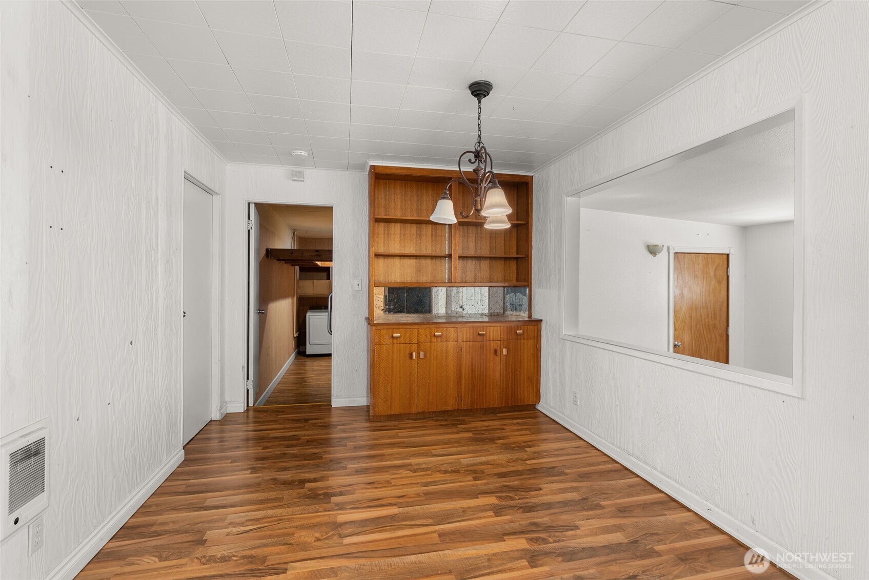 402 North 10th Street Elma, WA 98541 - Photo 14 of 35 a view of a room with wooden floor and entryway