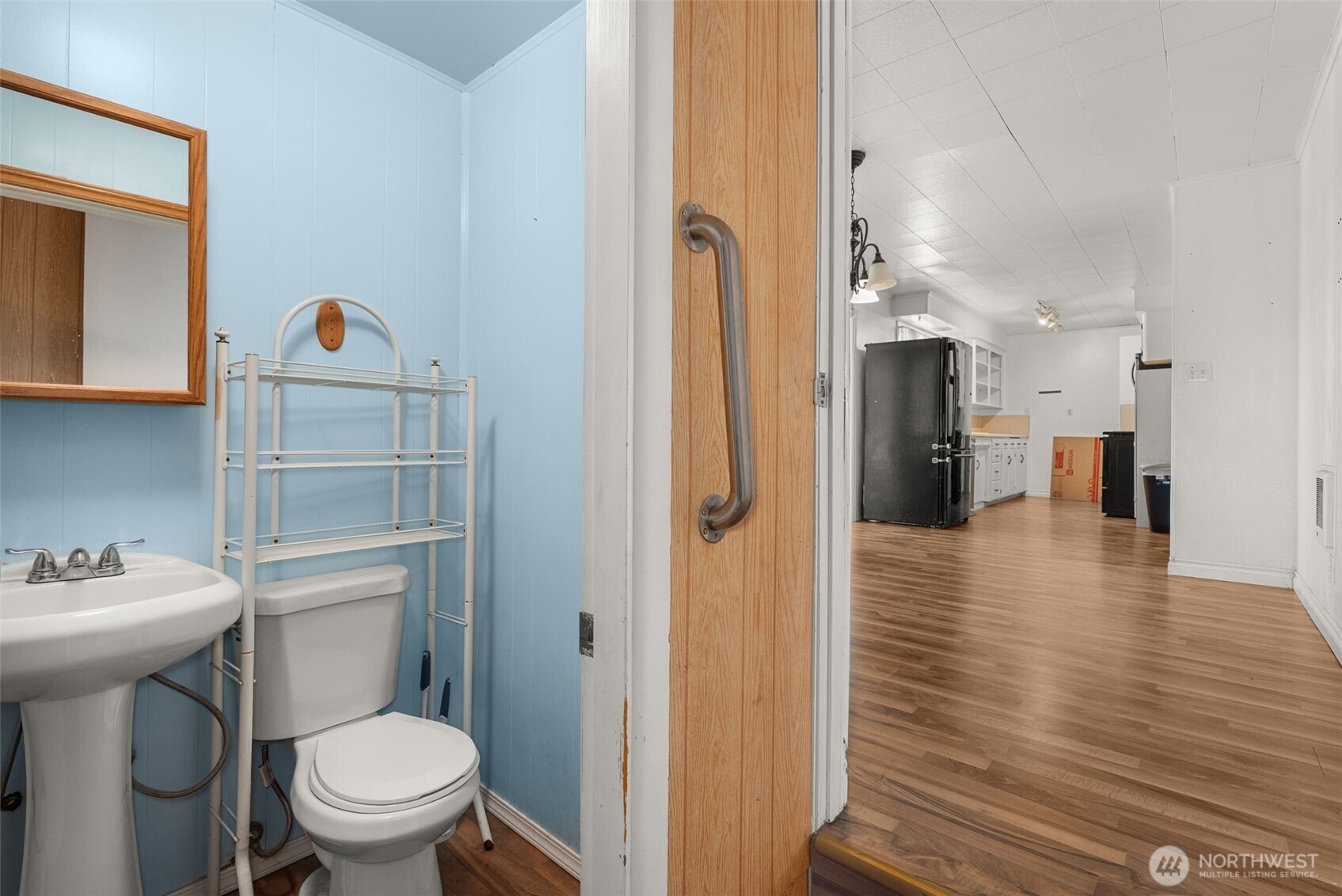 402 North 10th Street Elma, WA 98541 - Photo 24 of 35 a very nice looking room with a wooden floor and a toilet