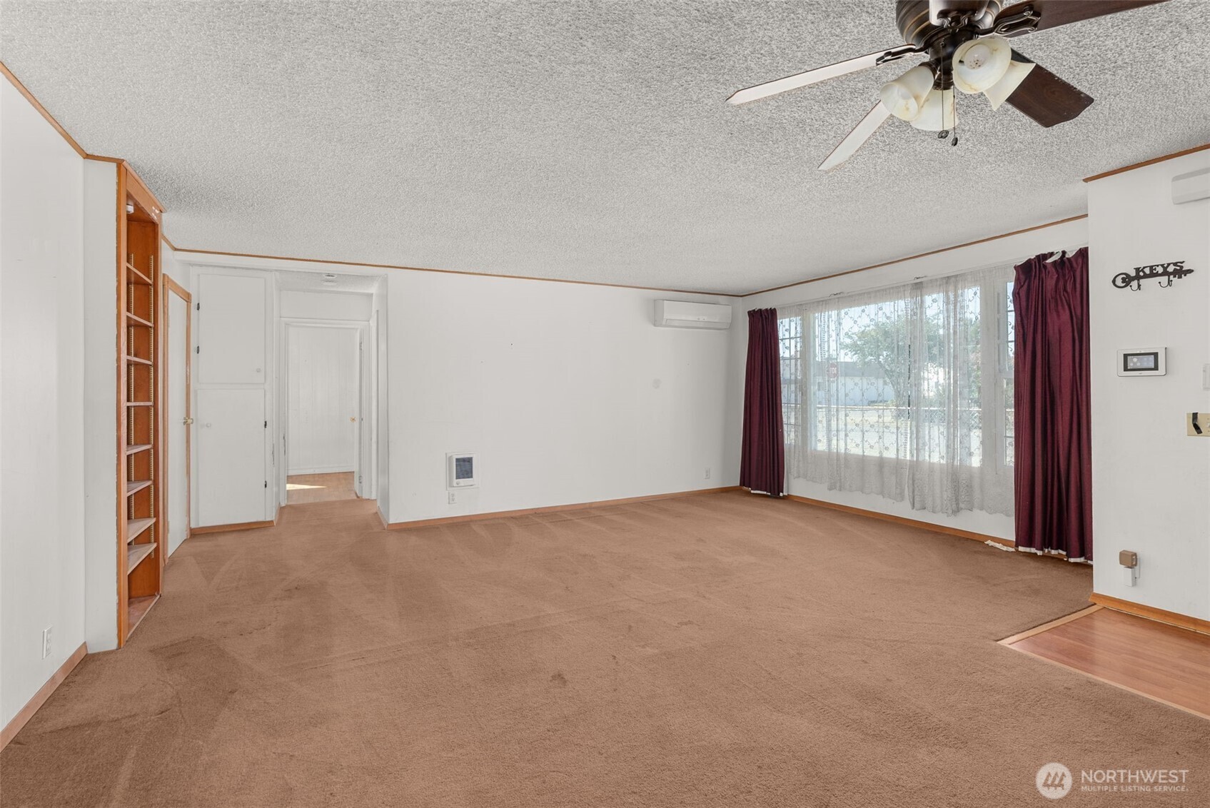 402 North 10th Street Elma, WA 98541 - Photo 10 of 35 a view of an empty room with a window