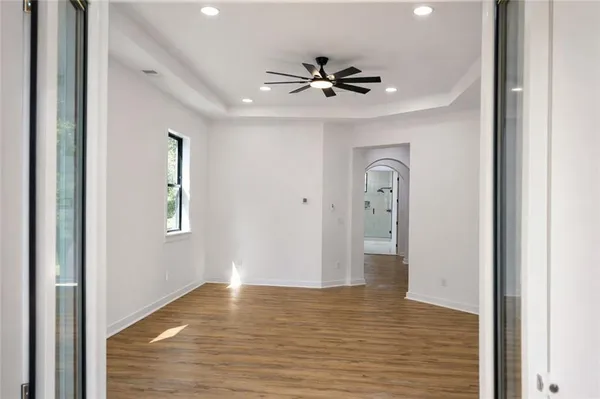 a white bath tub sitting in a bathroom