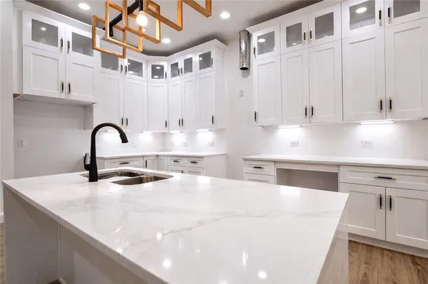 a close view of light fixtures and entryway
