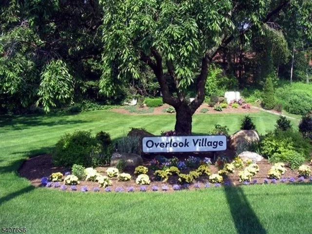 a view of sign board with a yard