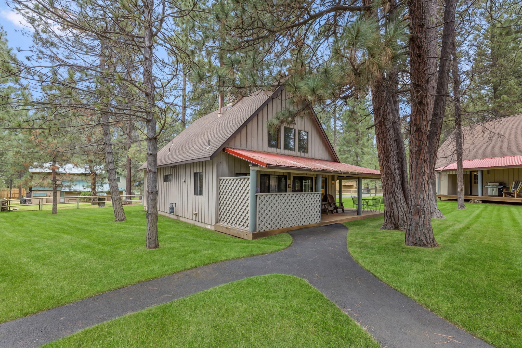 57505 Circle 4 Cabin Road, Unit 29 Sunriver, OR 97707 - Photo 30 of 35 a view of house with a yard