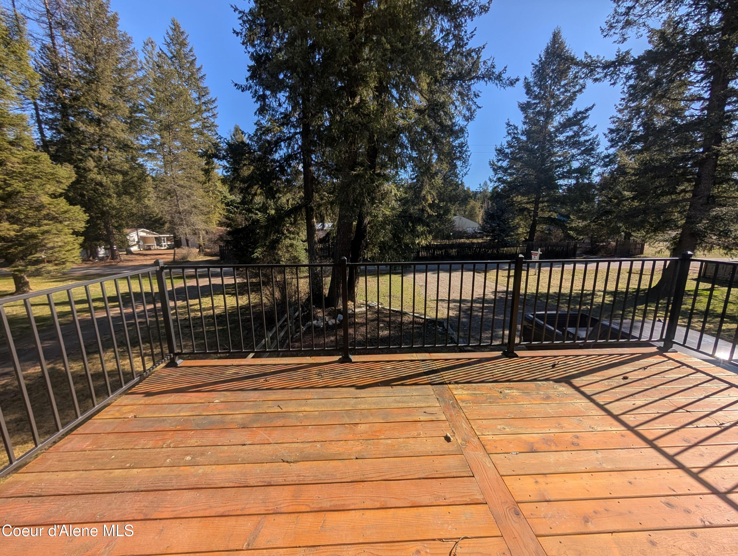 206 Waterfront Road Troy, MT 59935 - Photo 26 of 38 206 Waterfront new deck to front neighbo