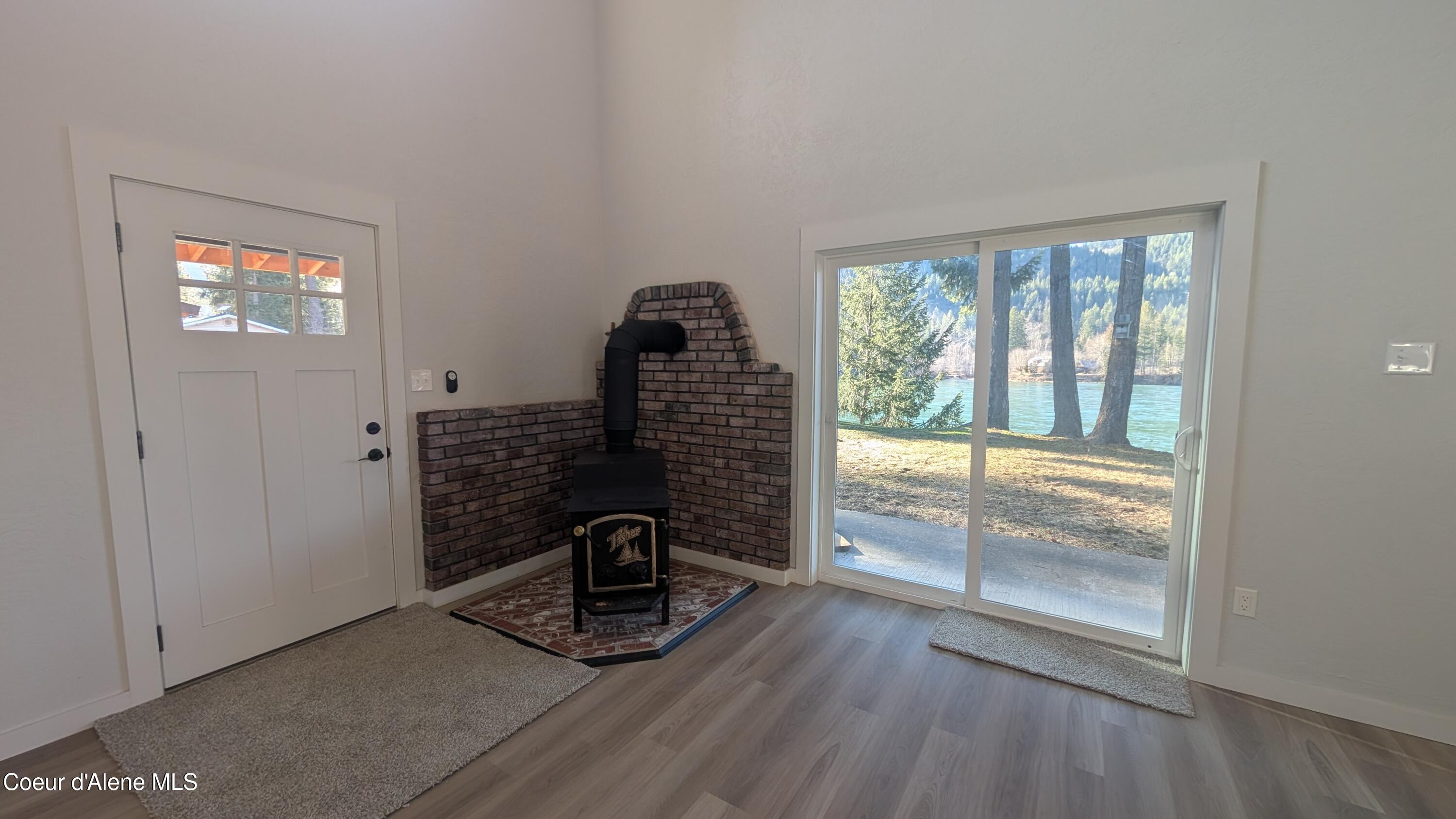 206 Waterfront Road Troy, MT 59935 - Photo 6 of 38 206 Waterfront pic 28 Wood stove and vie