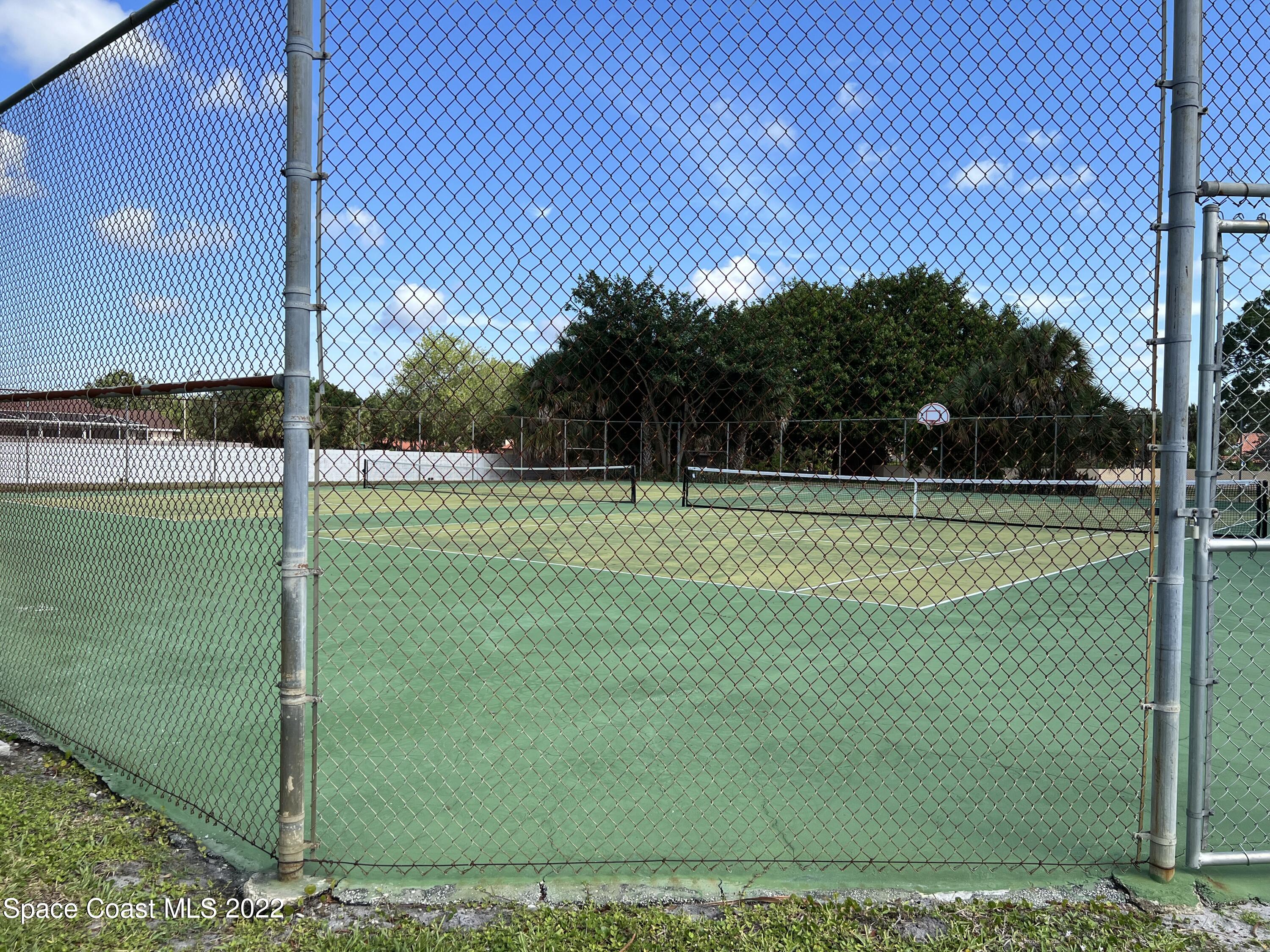634 Cedar Side Circle Northeast Palm Bay, FL 32905 - Photo 2 of 24 a view of a golf course