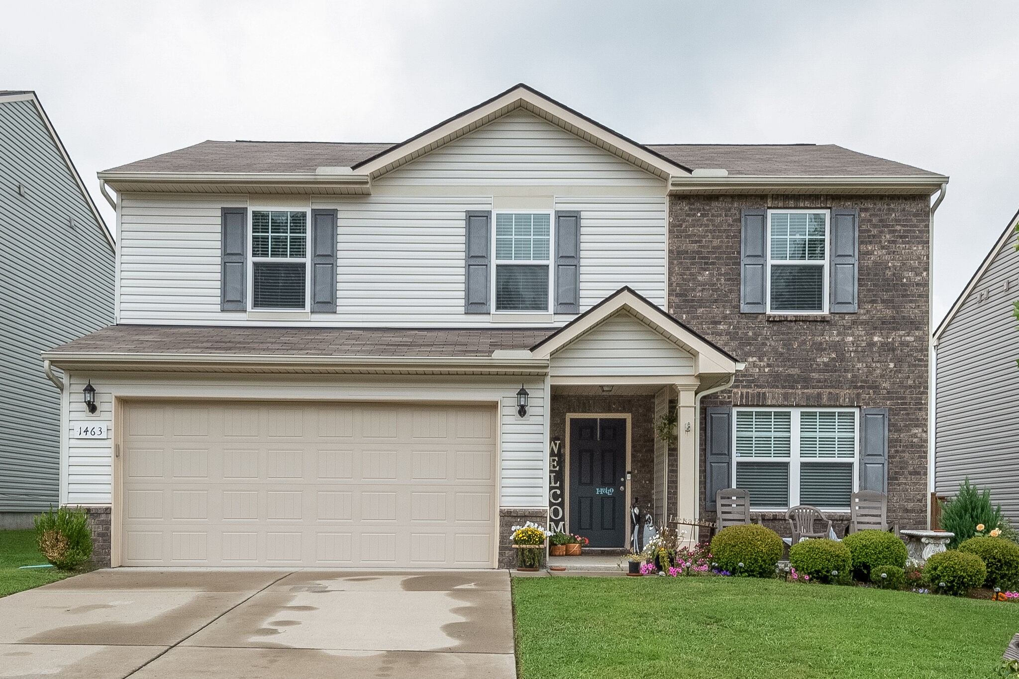 1463 Old Stone Road Lebanon, TN 37087 - Photo 1 of 32 a front view of a house with garden