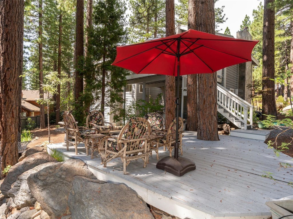 338 Woodridge Way Incline Village, NV 89451 - Photo 12 of 16 a view of a patio with chairs and umbrellas