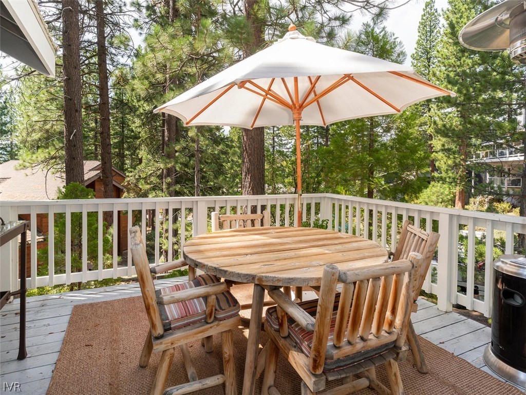 338 Woodridge Way Incline Village, NV 89451 - Photo 9 of 16 an outdoor space with furniture and umbrella