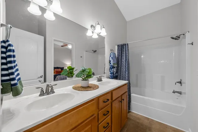 an aerial view of a house with swimming pool