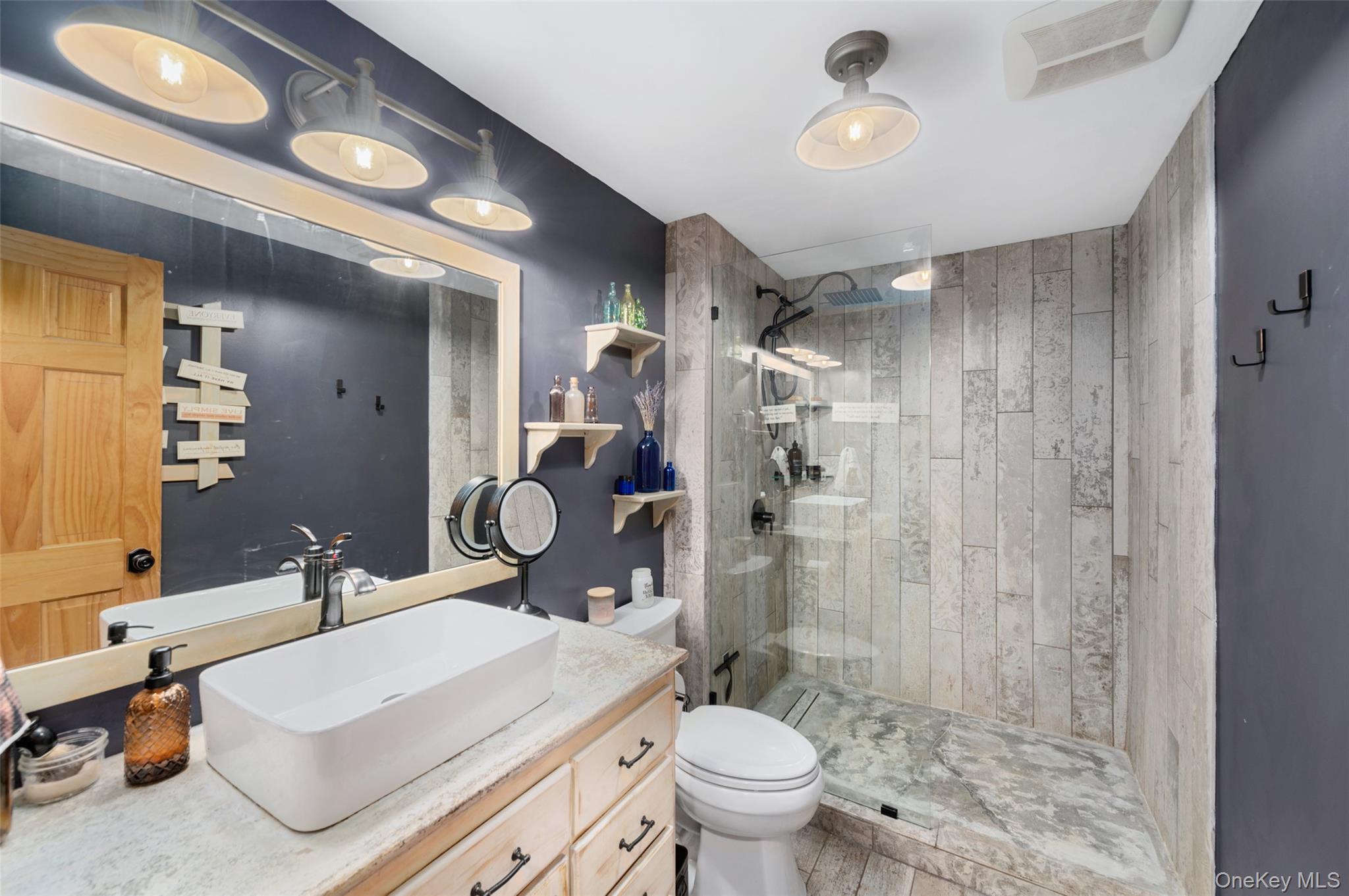 198 Hortontown Road Hopewell Junction, NY 12533 - Photo 12 of 36 a bathroom with a sink toilet and shower