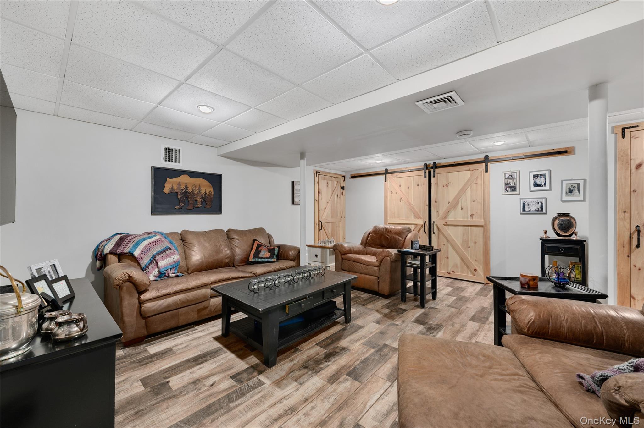 198 Hortontown Road Hopewell Junction, NY 12533 - Photo 22 of 36 a living room with furniture a flat screen tv and a large window