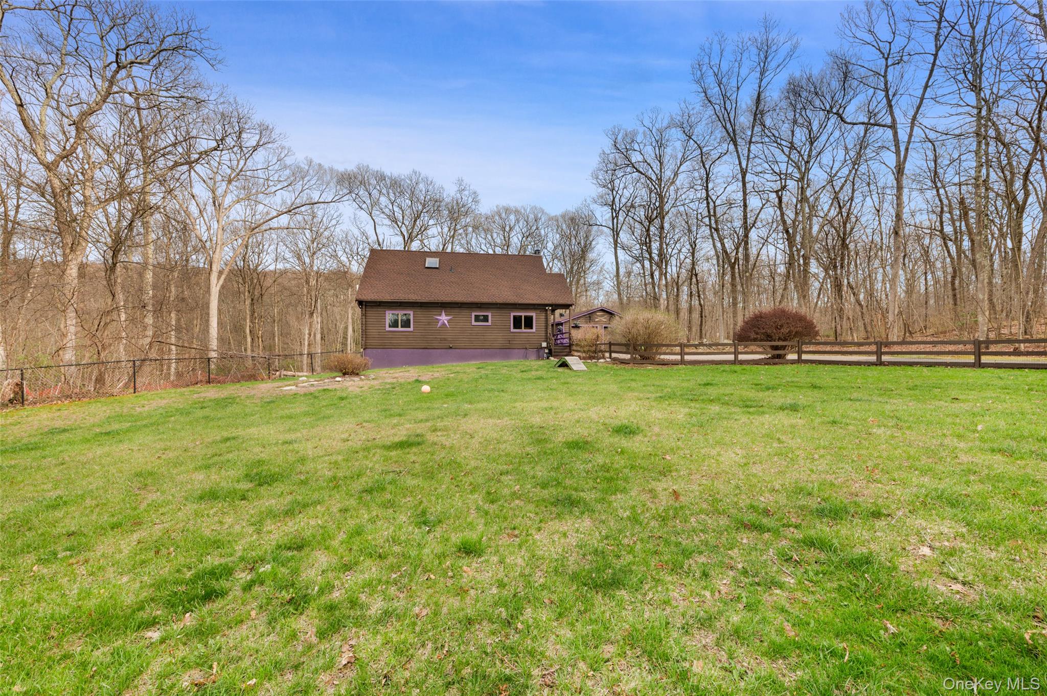 198 Hortontown Road Hopewell Junction, NY 12533 - Photo 36 of 36 a view of a yard with a house in the background