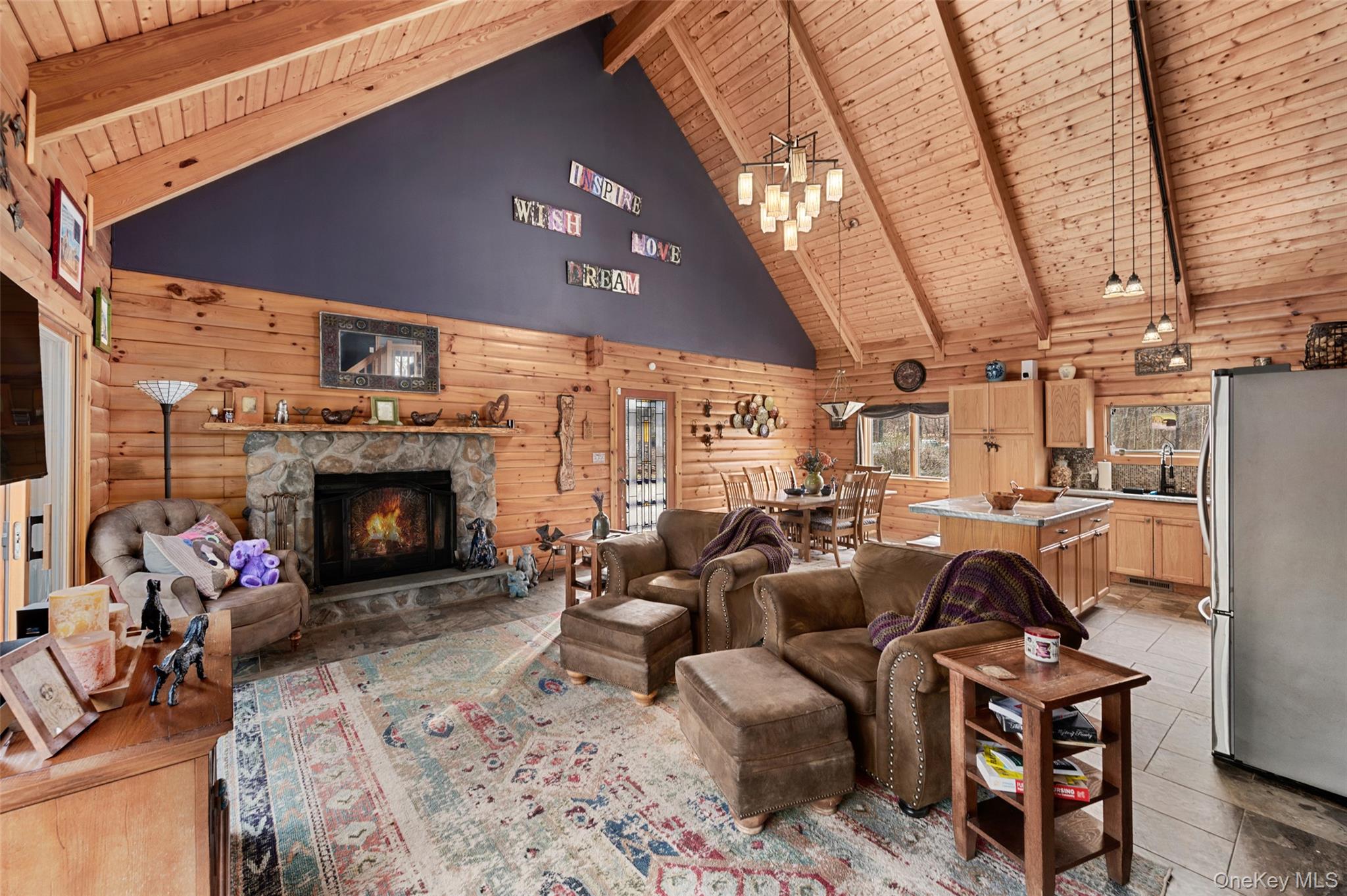 198 Hortontown Road Hopewell Junction, NY 12533 - Photo 5 of 36 a living room with furniture a fireplace and a flat screen tv