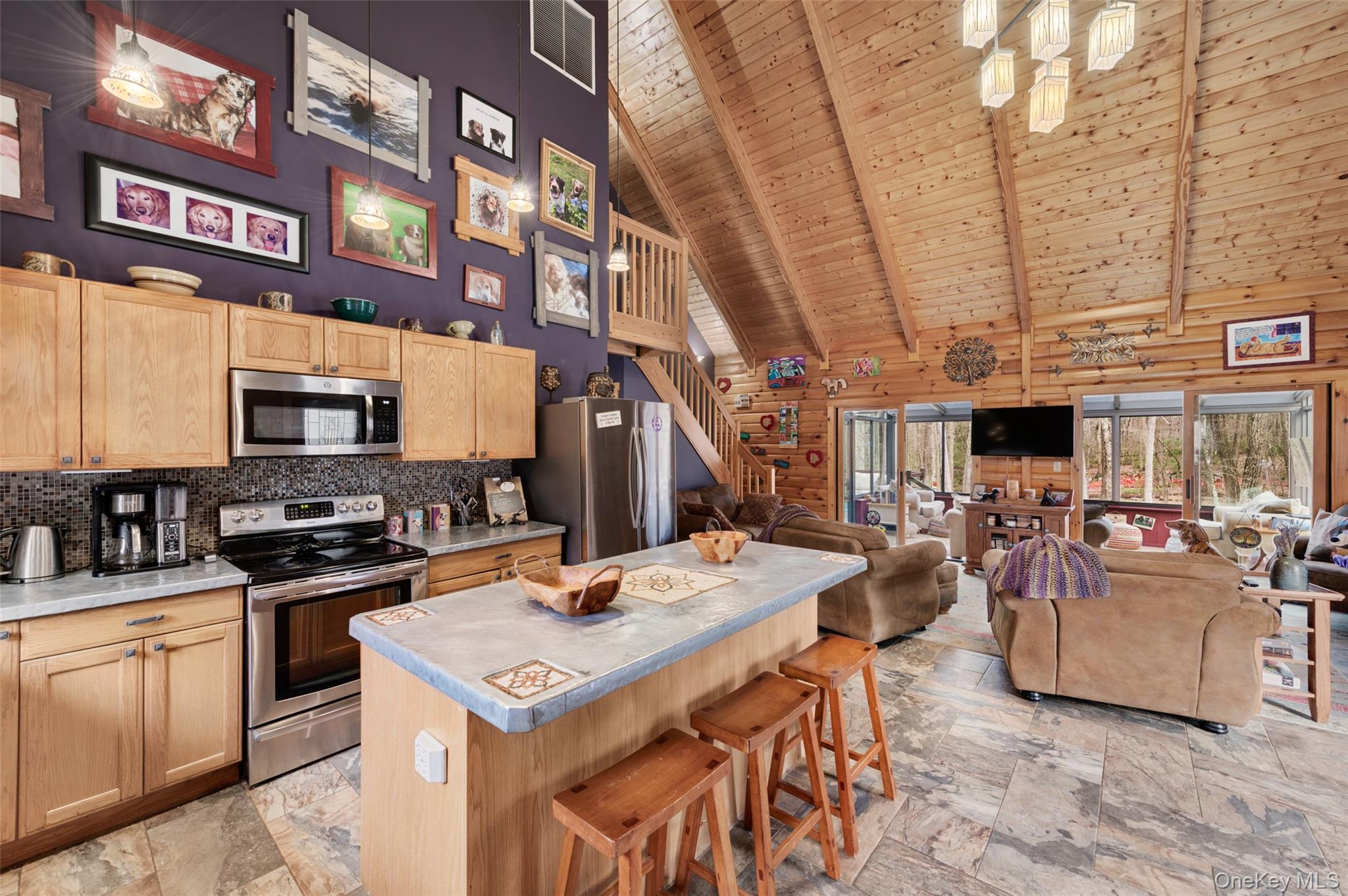 198 Hortontown Road Hopewell Junction, NY 12533 - Photo 9 of 36 a open kitchen with stainless steel appliances kitchen island granite countertop a stove and a sink