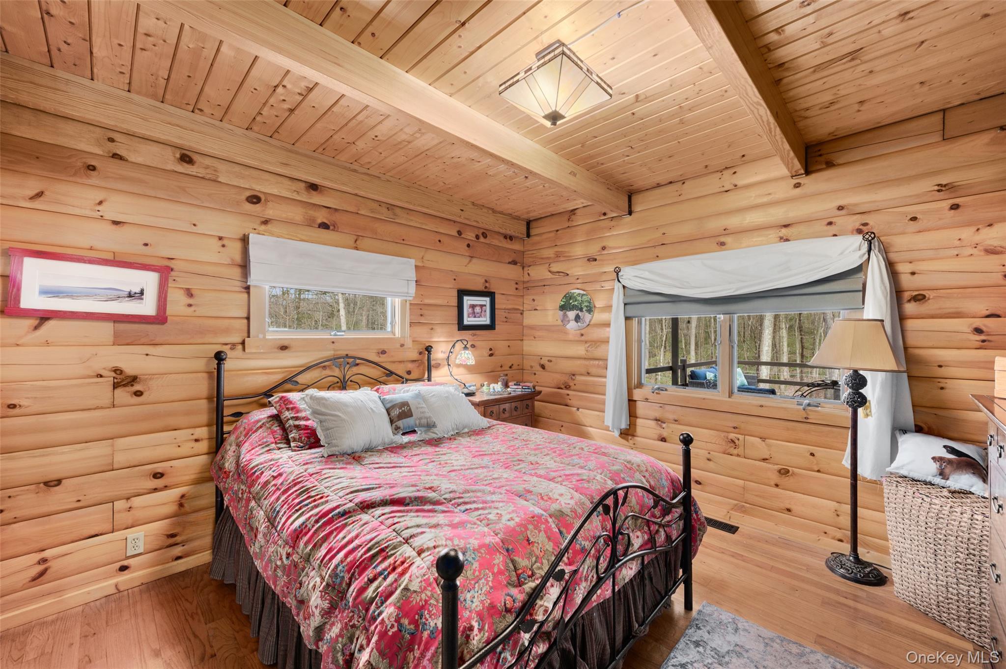 198 Hortontown Road Hopewell Junction, NY 12533 - Photo 10 of 36 a bedroom with a bed and wooden floor