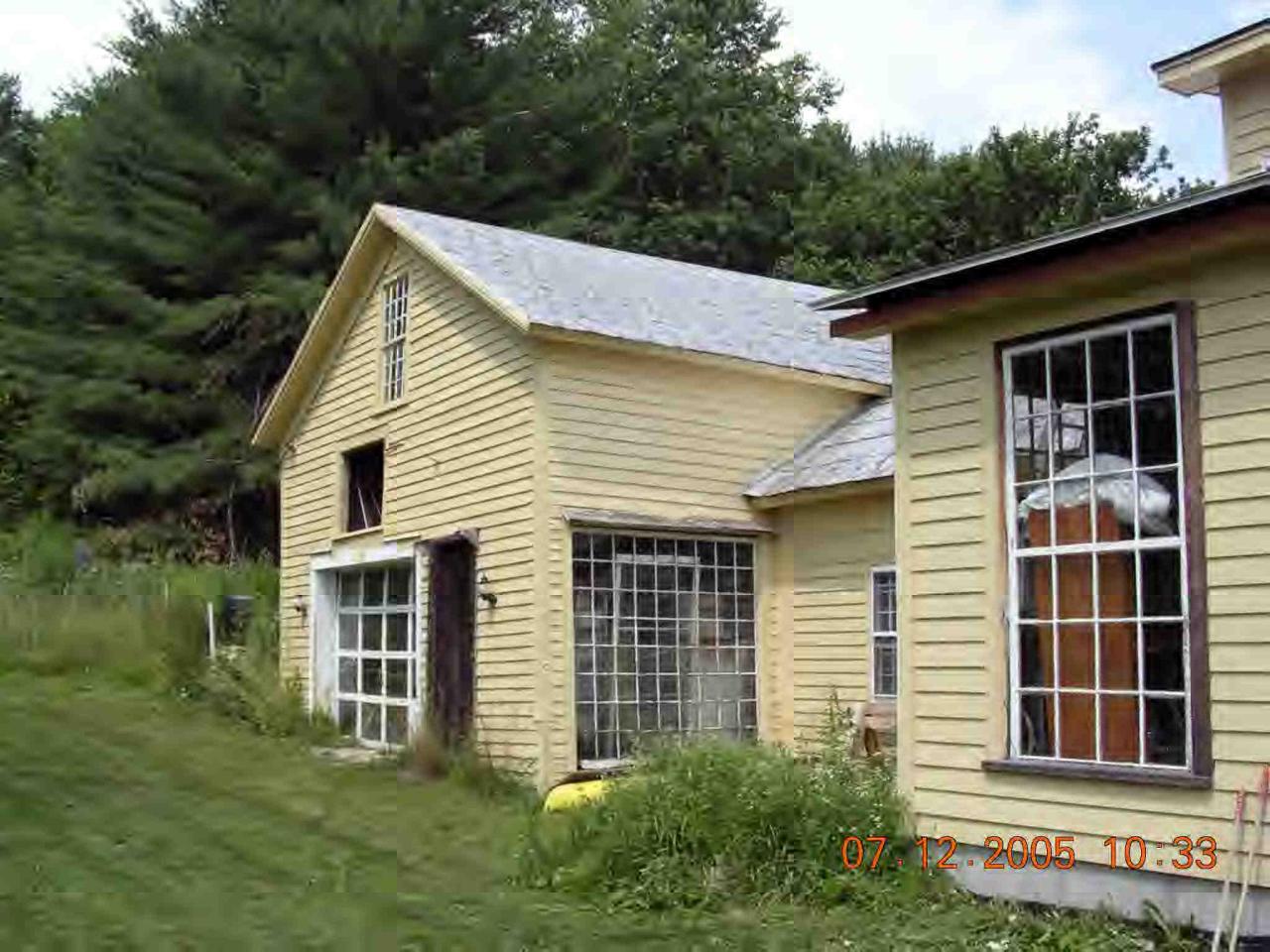 60 South Main Road Otis, MA 01253 - Photo 5 of 6 a view of a house with a yard