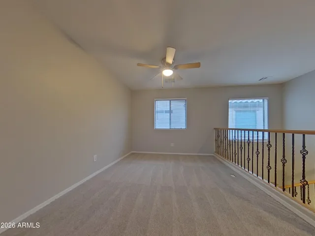 a bathroom with a shower and a toilet