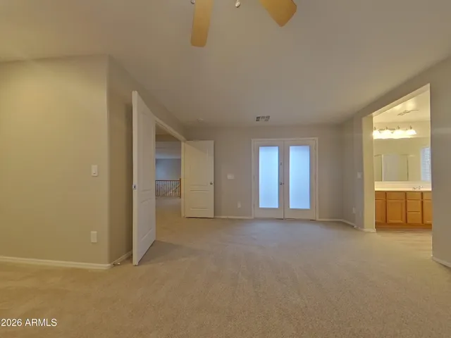 a kitchen with stainless steel appliances granite countertop a stove top oven and cabinets