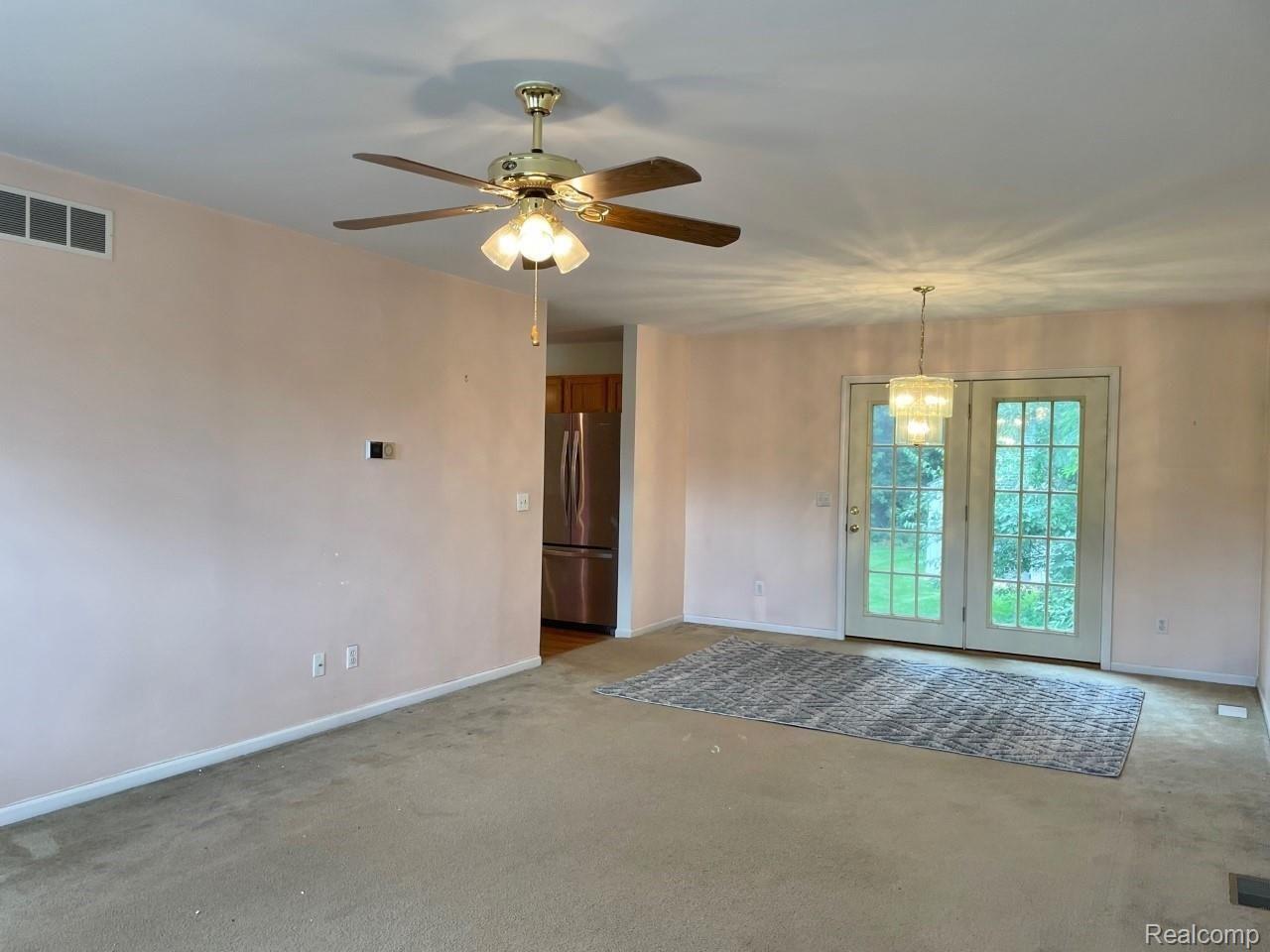 5099 Culver Road Brighton, MI 48114 - Photo 6 of 14 French doors off living/dining room