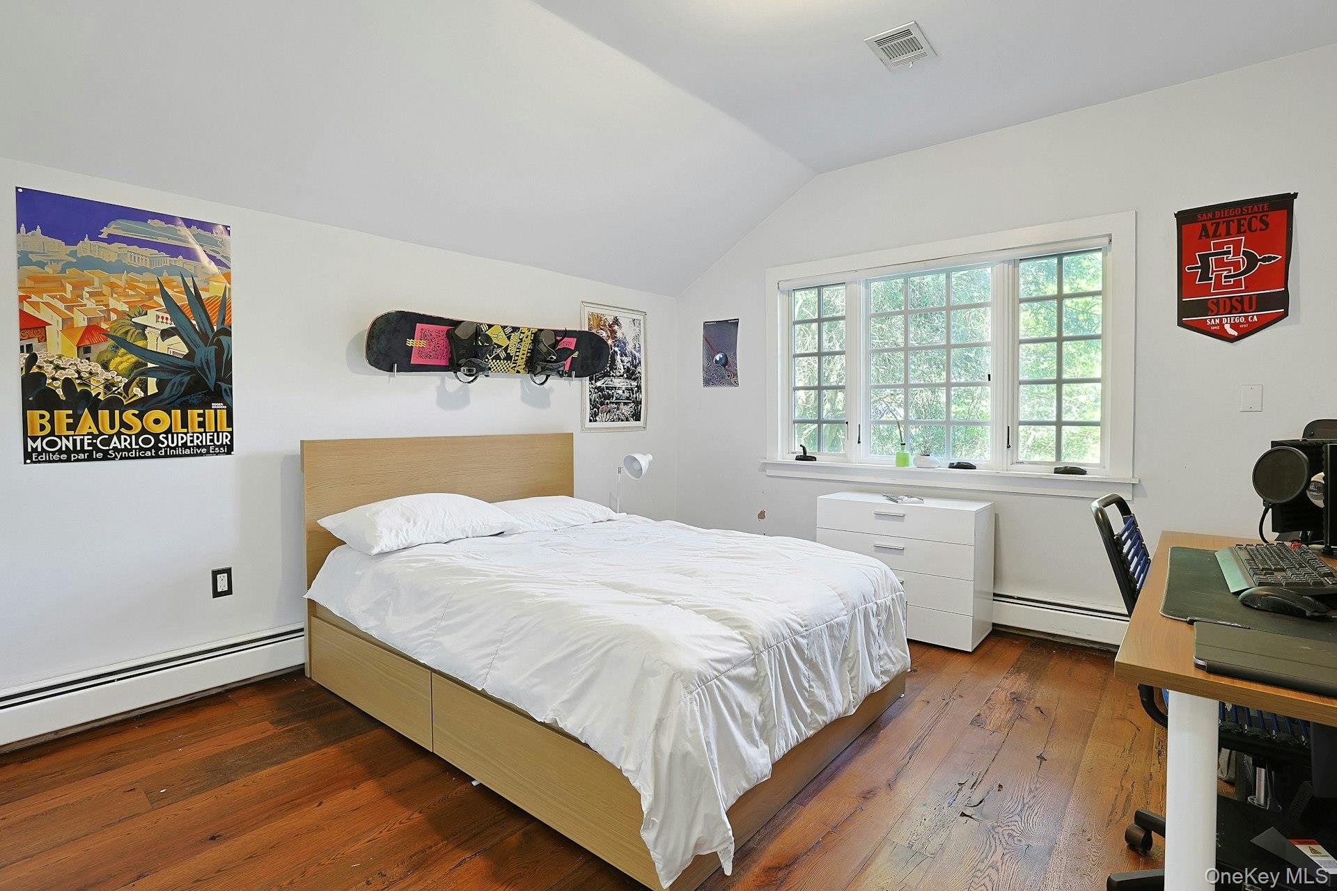 65 Douglas Road Chappaqua, NY 10514 - Photo 22 of 41 A comfortable first-floor bedroom adds ease and flexibility to the home, offering a welcoming space for guests or convenient main-level living.