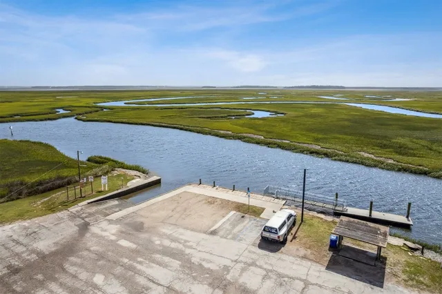 a view of swimming pool with a lounge chair