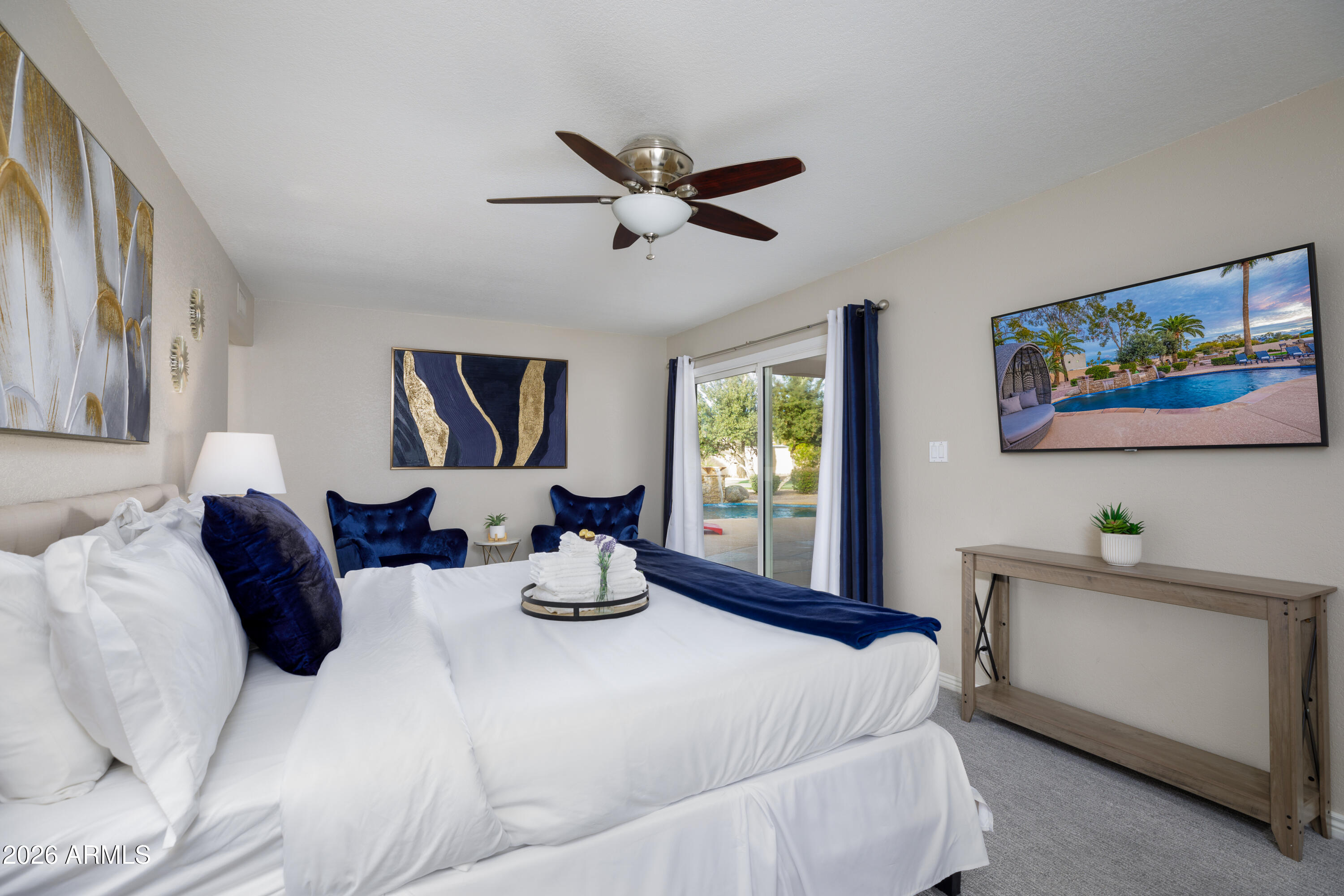 6932 East Presidio Road Scottsdale, AZ 85254 - Photo 17 of 30 a bedroom with a bed and window