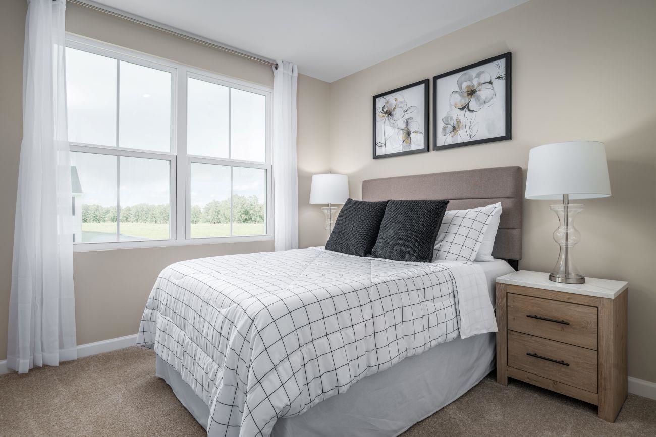 101 C Orchard Ridge Lane Harrisonburg, VA 22801 - Photo 10 of 14 a bedroom with a bed and a window