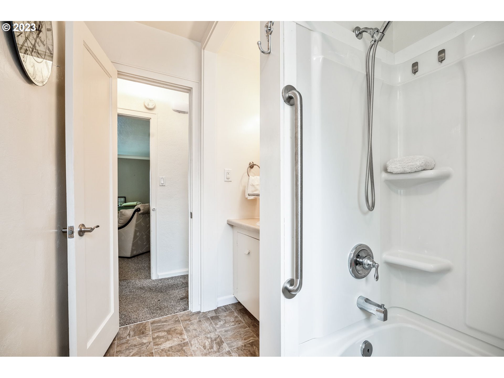 1335 B Street Springfield, OR 97477 - Photo 17 of 40 a bathroom with a shower and a sink