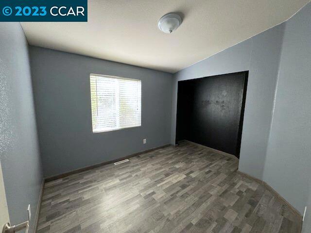 343 San Marcus Drive Vallejo, CA 94590 - Photo 14 of 20 an empty room with windows and closet